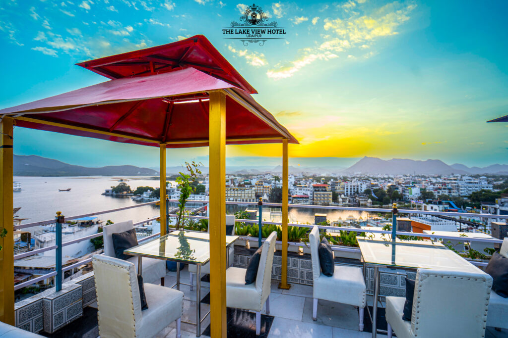 Rooftop dining overlooking Lake Pichola and Udaipur skyline at Lake View Hotel