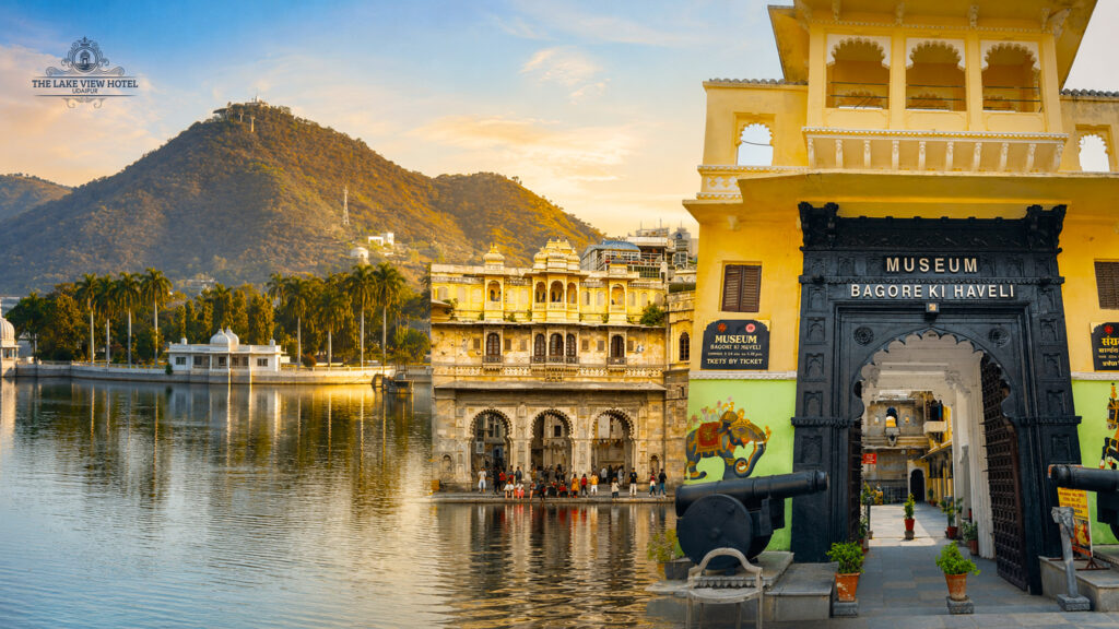 Bagore Ki Haveli overlooking Lake Pichola, iconic Udaipur tourist attraction and heritage landmark.
